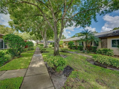 Welcome home to this stunning property located in Villas on the on Highland Lakes Executive Golf Course in Florida - for sale on GolfHomes.com, golf home, golf lot