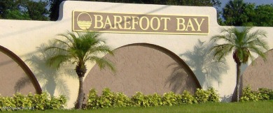 This property boasts numerous desirable features. New Roof 2023 on Barefoot Bay Golf Course in Florida - for sale on GolfHomes.com, golf home, golf lot