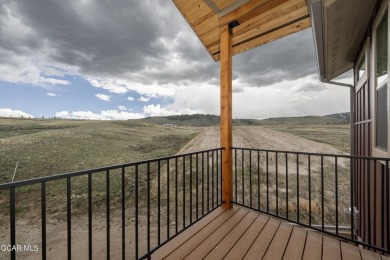 Tucked against a serene hillside in the coveted Grand Elk golf on Grand Elk Ranch and Club in Colorado - for sale on GolfHomes.com, golf home, golf lot