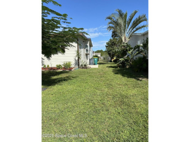This property boasts numerous desirable features. New Roof 2023 on Barefoot Bay Golf Course in Florida - for sale on GolfHomes.com, golf home, golf lot