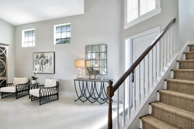 Discover timeless elegance in this 5-bedroom, 5.1/2 -bath on Palm Beach Polo and Country Club in Florida - for sale on GolfHomes.com, golf home, golf lot