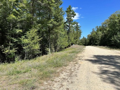 Spacious building site in Hemlock Views just west of Manistique on Stoney Point Golf Course in Michigan - for sale on GolfHomes.com, golf home, golf lot