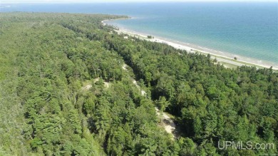 Spacious building site in Hemlock Views just west of Manistique on Stoney Point Golf Course in Michigan - for sale on GolfHomes.com, golf home, golf lot