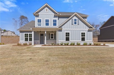 Step into luxury with the beautiful Jamestown model by Paran on Traditions of Braselton Golf Club in Georgia - for sale on GolfHomes.com, golf home, golf lot