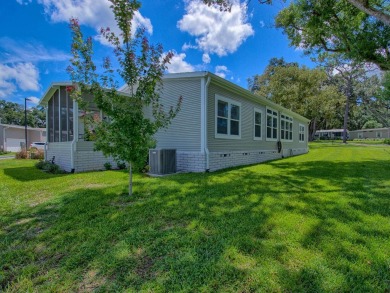 This 3 bedroom split Malibu is a popular floor plan and has on Water Oak Country Club Estates in Florida - for sale on GolfHomes.com, golf home, golf lot