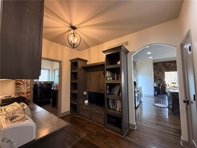 Welcome to an exceptional 1.5-story residence, perfectly on Tiffany Greens Golf Club in Missouri - for sale on GolfHomes.com, golf home, golf lot