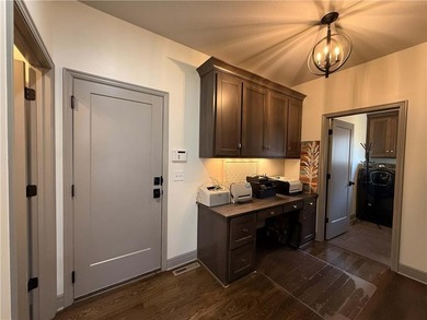 Welcome to an exceptional 1.5-story residence, perfectly on Tiffany Greens Golf Club in Missouri - for sale on GolfHomes.com, golf home, golf lot