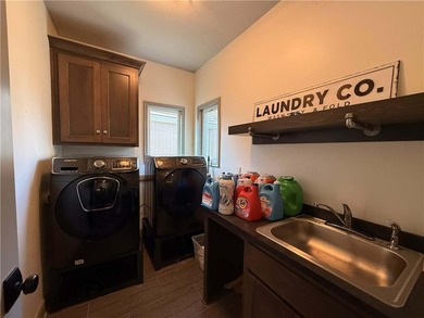 Welcome to an exceptional 1.5-story residence, perfectly on Tiffany Greens Golf Club in Missouri - for sale on GolfHomes.com, golf home, golf lot