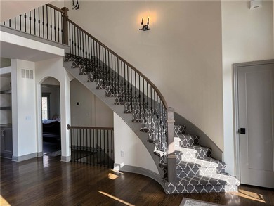 Welcome to an exceptional 1.5-story residence, perfectly on Tiffany Greens Golf Club in Missouri - for sale on GolfHomes.com, golf home, golf lot