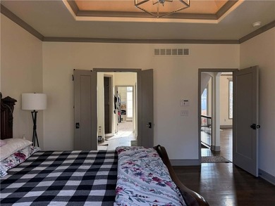 Welcome to an exceptional 1.5-story residence, perfectly on Tiffany Greens Golf Club in Missouri - for sale on GolfHomes.com, golf home, golf lot