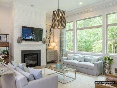 Enjoy a beautiful 1 acre, wooded homesite with new construction on The Palisades Country Club in North Carolina - for sale on GolfHomes.com, golf home, golf lot