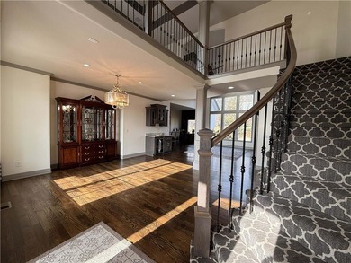 Welcome to an exceptional 1.5-story residence, perfectly on Tiffany Greens Golf Club in Missouri - for sale on GolfHomes.com, golf home, golf lot