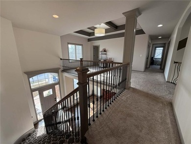 Welcome to an exceptional 1.5-story residence, perfectly on Tiffany Greens Golf Club in Missouri - for sale on GolfHomes.com, golf home, golf lot