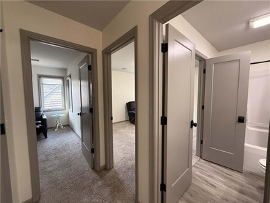 Welcome to an exceptional 1.5-story residence, perfectly on Tiffany Greens Golf Club in Missouri - for sale on GolfHomes.com, golf home, golf lot