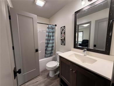 Welcome to an exceptional 1.5-story residence, perfectly on Tiffany Greens Golf Club in Missouri - for sale on GolfHomes.com, golf home, golf lot