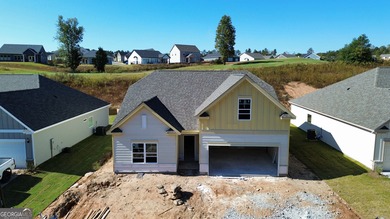 The Harrison Plan built by Stephen Elliott Homes. Quick Move-In! on Chimney Oaks Golf Club in Georgia - for sale on GolfHomes.com, golf home, golf lot