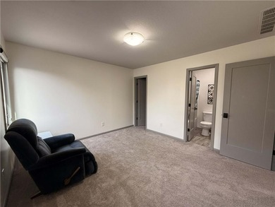 Welcome to an exceptional 1.5-story residence, perfectly on Tiffany Greens Golf Club in Missouri - for sale on GolfHomes.com, golf home, golf lot