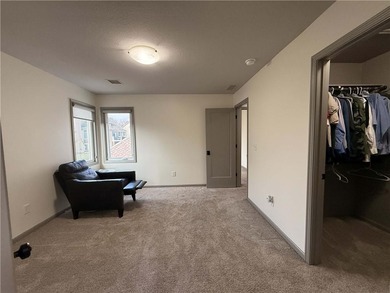 Welcome to an exceptional 1.5-story residence, perfectly on Tiffany Greens Golf Club in Missouri - for sale on GolfHomes.com, golf home, golf lot