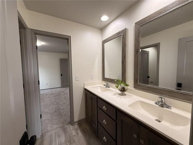 Welcome to an exceptional 1.5-story residence, perfectly on Tiffany Greens Golf Club in Missouri - for sale on GolfHomes.com, golf home, golf lot