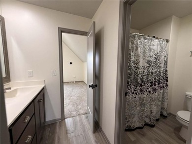 Welcome to an exceptional 1.5-story residence, perfectly on Tiffany Greens Golf Club in Missouri - for sale on GolfHomes.com, golf home, golf lot