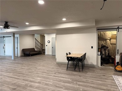 Welcome to an exceptional 1.5-story residence, perfectly on Tiffany Greens Golf Club in Missouri - for sale on GolfHomes.com, golf home, golf lot