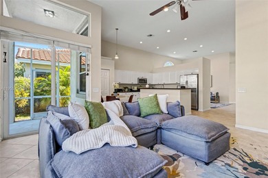 An elegant single-story Mediterranean-style pool home on TPC Eagle Trace in Florida - for sale on GolfHomes.com, golf home, golf lot