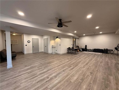 Welcome to an exceptional 1.5-story residence, perfectly on Tiffany Greens Golf Club in Missouri - for sale on GolfHomes.com, golf home, golf lot