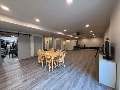 Welcome to an exceptional 1.5-story residence, perfectly on Tiffany Greens Golf Club in Missouri - for sale on GolfHomes.com, golf home, golf lot