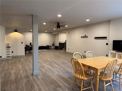 Welcome to an exceptional 1.5-story residence, perfectly on Tiffany Greens Golf Club in Missouri - for sale on GolfHomes.com, golf home, golf lot