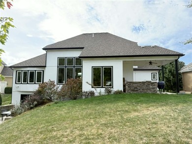 Welcome to an exceptional 1.5-story residence, perfectly on Tiffany Greens Golf Club in Missouri - for sale on GolfHomes.com, golf home, golf lot