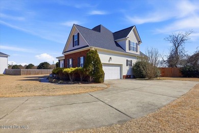 Welcome home to this custom-built 4-bedroom, 3-bathroom home in on Walnut Creek Country Club in North Carolina - for sale on GolfHomes.com, golf home, golf lot