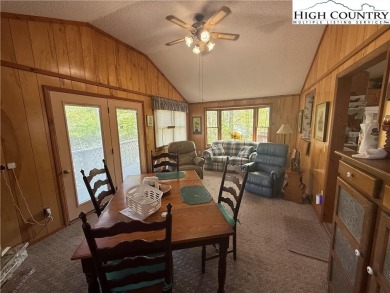 Nestled in the heart of the highly desirable Linville Land on Land Harbor Golf Course in North Carolina - for sale on GolfHomes.com, golf home, golf lot