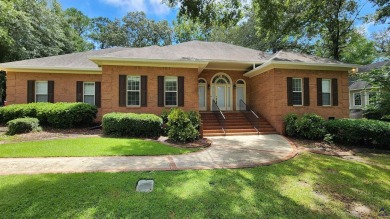 Discover this beautifully crafted 4-bedroom, all-brick home in on Landings Golf Club in Georgia - for sale on GolfHomes.com, golf home, golf lot