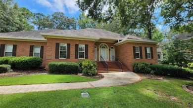 Discover this beautifully crafted 4-bedroom, all-brick home in on Landings Golf Club in Georgia - for sale on GolfHomes.com, golf home, golf lot