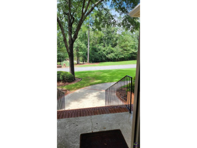 Discover this beautifully crafted 4-bedroom, all-brick home in on Landings Golf Club in Georgia - for sale on GolfHomes.com, golf home, golf lot
