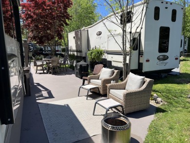 Beautiful lakefront lot with ornamental tree and nice patio for on Bent Creek Golf Course in Tennessee - for sale on GolfHomes.com, golf home, golf lot