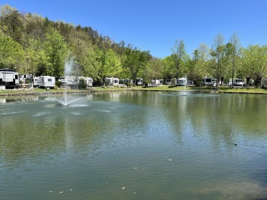 Beautiful lakefront lot with ornamental tree and nice patio for on Bent Creek Golf Course in Tennessee - for sale on GolfHomes.com, golf home, golf lot