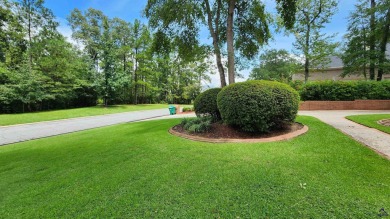 Discover this beautifully crafted 4-bedroom, all-brick home in on Landings Golf Club in Georgia - for sale on GolfHomes.com, golf home, golf lot