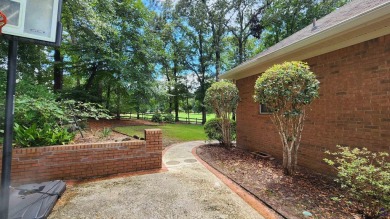 Discover this beautifully crafted 4-bedroom, all-brick home in on Landings Golf Club in Georgia - for sale on GolfHomes.com, golf home, golf lot