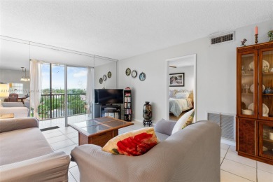 Just bring your swimsuit and immerse yourself in the effortless on Pompano Beach Golf Course  in Florida - for sale on GolfHomes.com, golf home, golf lot