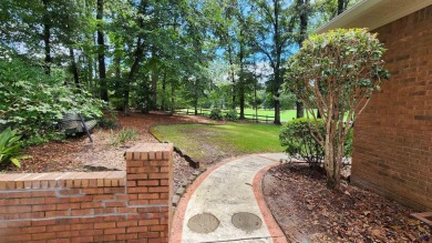 Discover this beautifully crafted 4-bedroom, all-brick home in on Landings Golf Club in Georgia - for sale on GolfHomes.com, golf home, golf lot
