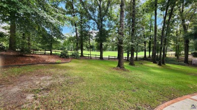 Discover this beautifully crafted 4-bedroom, all-brick home in on Landings Golf Club in Georgia - for sale on GolfHomes.com, golf home, golf lot