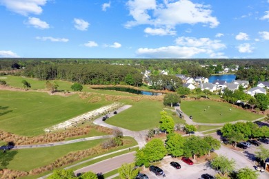 Fabulous elevated home overlooking lake in the highly desirable on RiverTowne Country Club in South Carolina - for sale on GolfHomes.com, golf home, golf lot