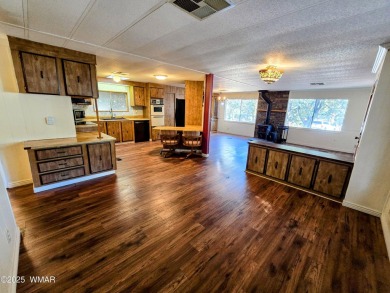 Welcome to this lovingly maintained 2-bedroom, 2-bath home on Bison Golf and Country Club in Arizona - for sale on GolfHomes.com, golf home, golf lot