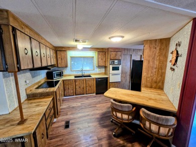 Welcome to this lovingly maintained 2-bedroom, 2-bath home on Bison Golf and Country Club in Arizona - for sale on GolfHomes.com, golf home, golf lot