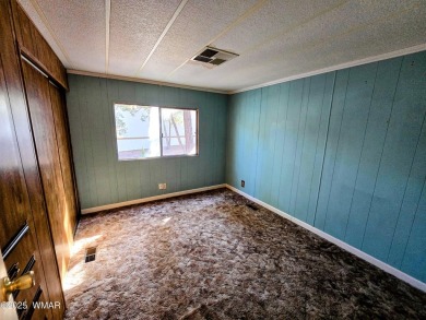 Welcome to this lovingly maintained 2-bedroom, 2-bath home on Bison Golf and Country Club in Arizona - for sale on GolfHomes.com, golf home, golf lot