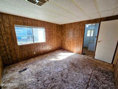Welcome to this lovingly maintained 2-bedroom, 2-bath home on Bison Golf and Country Club in Arizona - for sale on GolfHomes.com, golf home, golf lot