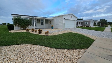 Prepare to be enchanted the moment you arrive at this 2019 Palm on The Riverside Golf Club in Florida - for sale on GolfHomes.com, golf home, golf lot