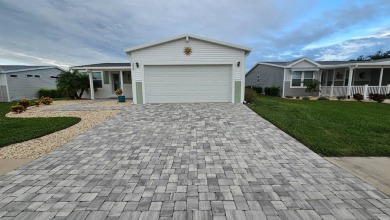 Prepare to be enchanted the moment you arrive at this 2019 Palm on The Riverside Golf Club in Florida - for sale on GolfHomes.com, golf home, golf lot