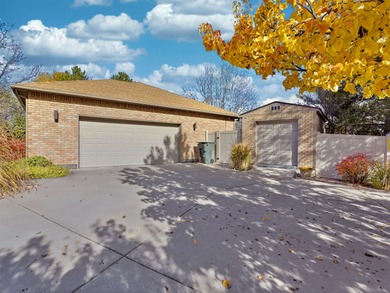 Discover this beautiful brick ranch-style home nestled in the on Bookcliff Country Club in Colorado - for sale on GolfHomes.com, golf home, golf lot